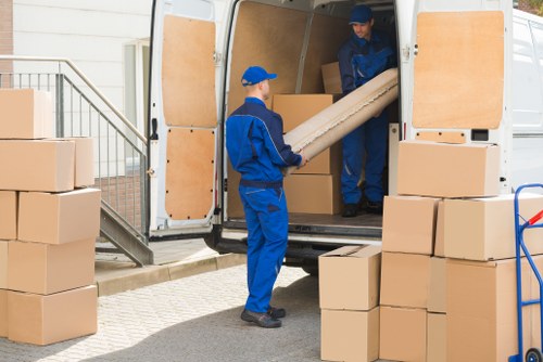 Professional flat removals in Welling with careful loading from an apartment building