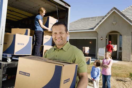 Packed furniture and boxes prepared for household storage in Welling